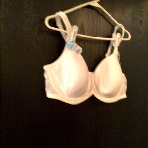 3 Playtex underwire brand new bras.  1 white and 2 nude. Size 42c.